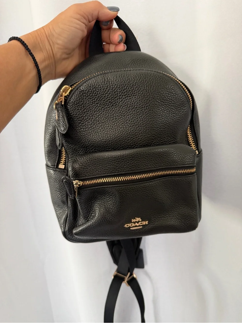 Coach compact pebbled